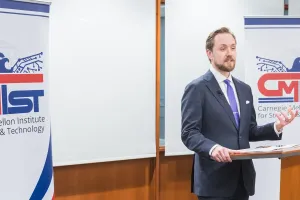 Harry Krejsa speaking at a podium