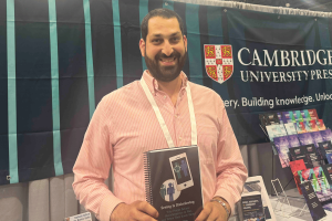 Dan Silverman with a copy of his book